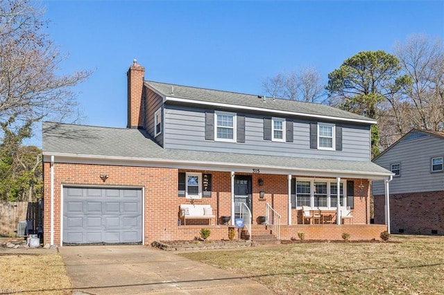 view of front of house featuring covered porch, a front lawn, and a garage