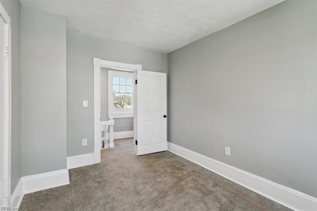 unfurnished bedroom featuring carpet