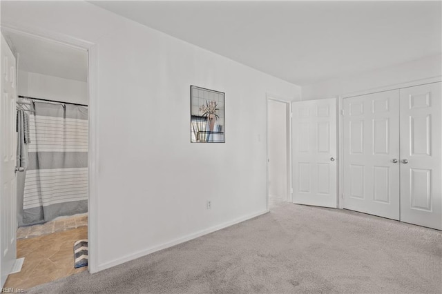 bedroom with light carpet