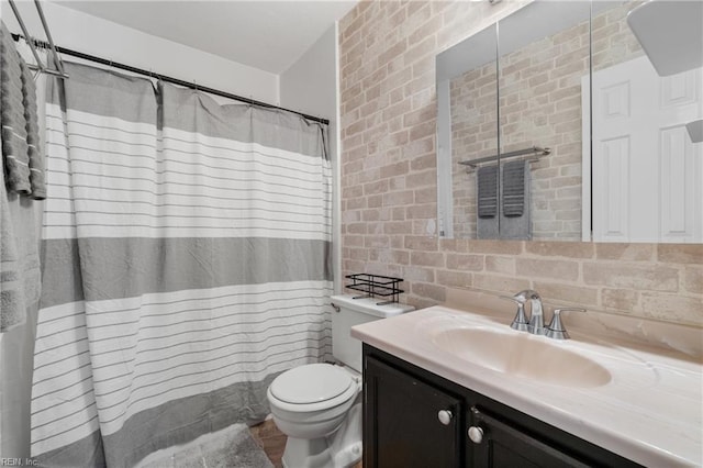 bathroom featuring vanity, backsplash, toilet, and a shower with shower curtain