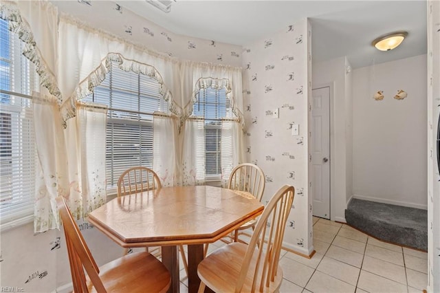 dining space with light tile patterned floors