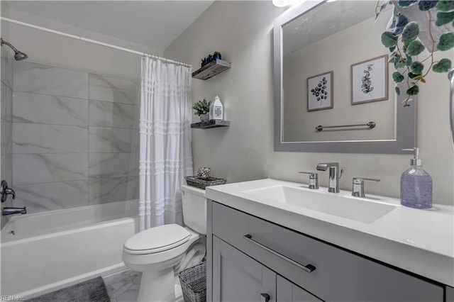 full bathroom featuring vanity, toilet, and shower / tub combo