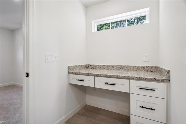 bathroom with tile patterned flooring