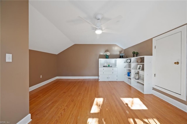 bonus room with vaulted ceiling, ceiling fan, and light hardwood / wood-style floors