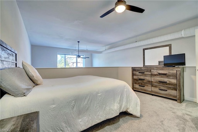 bedroom featuring ceiling fan and light colored carpet