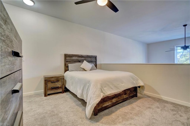 bedroom with light colored carpet and ceiling fan