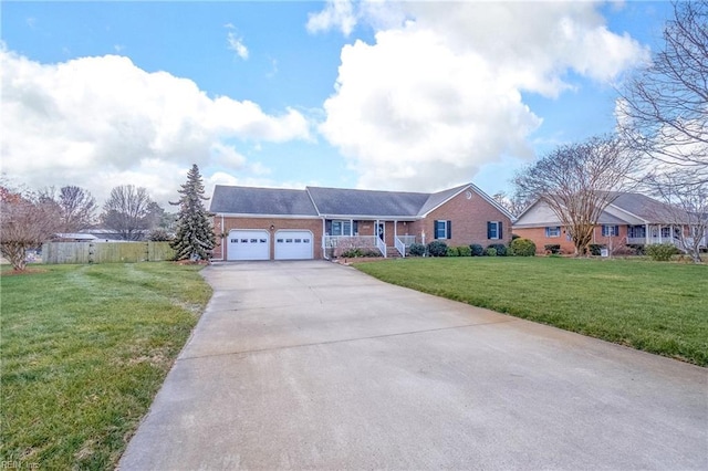 ranch-style house with a garage and a front yard