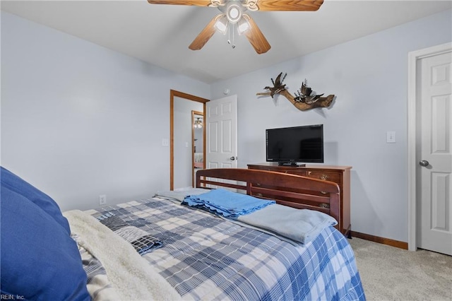 bedroom with ceiling fan and light carpet