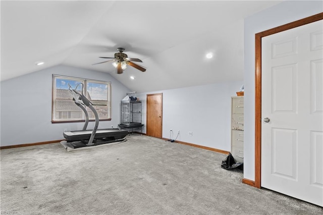 workout area featuring lofted ceiling, light carpet, and ceiling fan