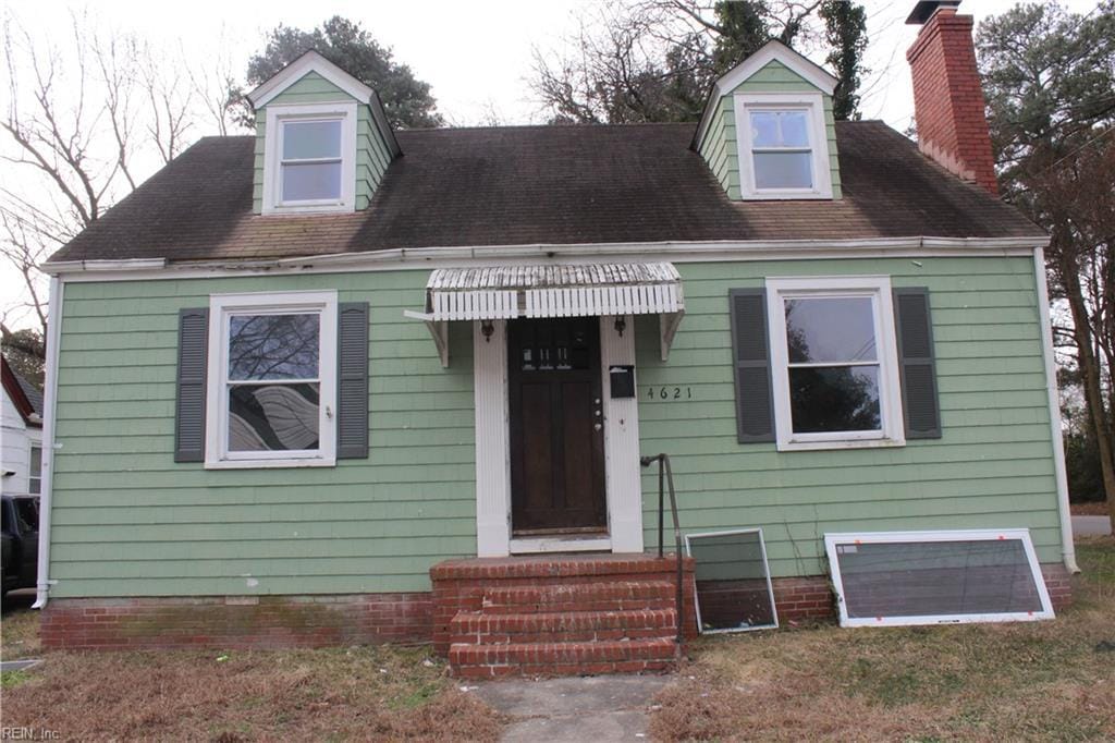 view of new england style home