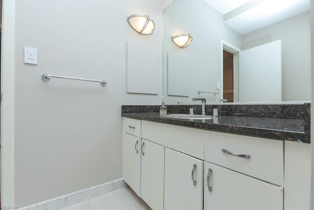 bathroom with vanity and tile patterned flooring