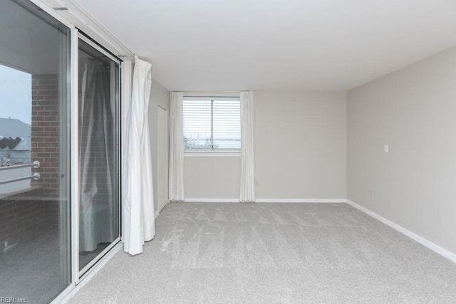 empty room with light colored carpet