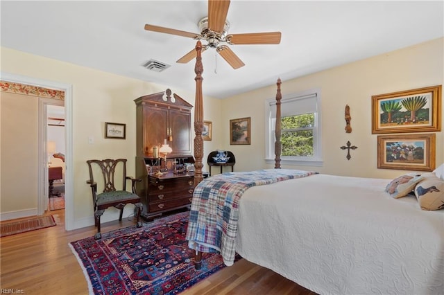 bedroom featuring ceiling fan and light hardwood / wood-style floors