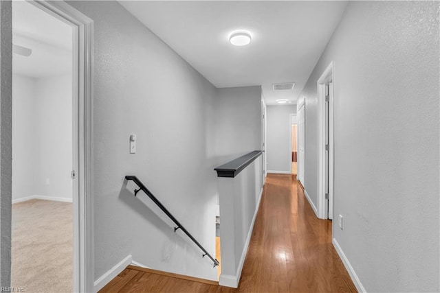 hallway featuring hardwood / wood-style floors