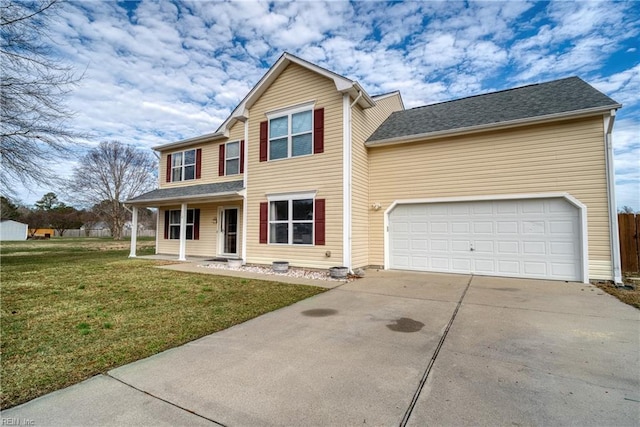 view of front of home featuring a front yard, covered porch, and a garage