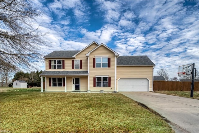 view of front facade featuring a front lawn and a garage