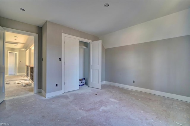 unfurnished bedroom with a closet