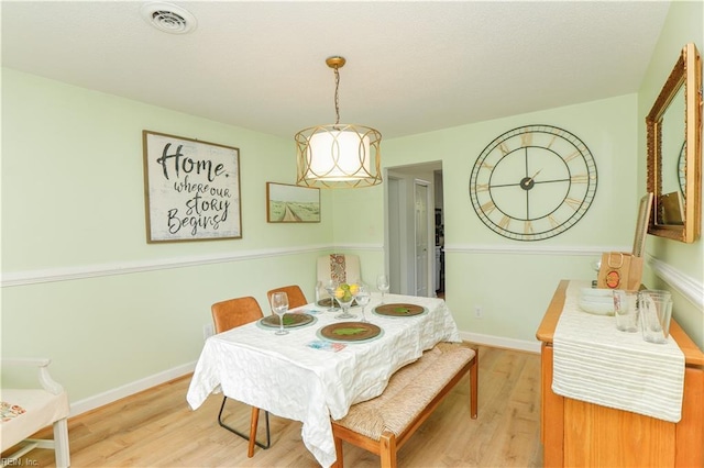 dining area featuring light hardwood / wood-style floors