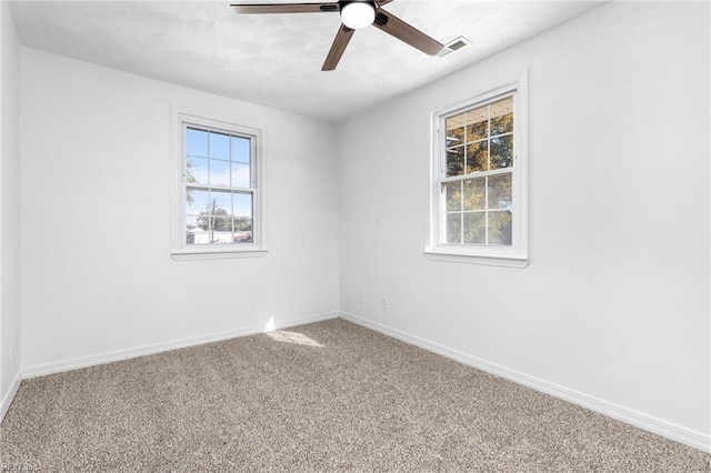 carpeted empty room with ceiling fan