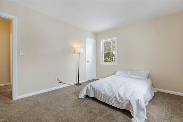 bedroom featuring carpet