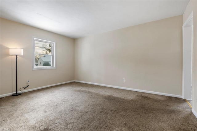 empty room featuring carpet flooring