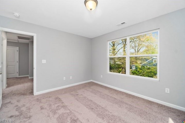 view of carpeted spare room