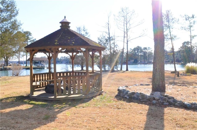 view of yard with a water view and a gazebo