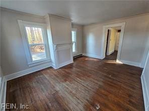 unfurnished living room with dark wood-type flooring and crown molding