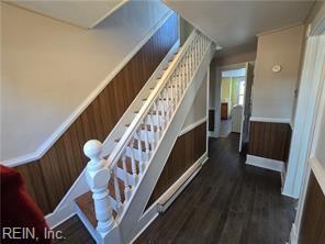 stairway featuring hardwood / wood-style floors