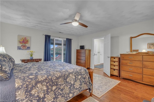 bedroom featuring ceiling fan and light wood-type flooring