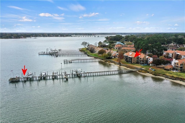 drone / aerial view with a water view