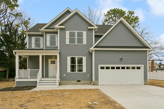 view of front of house featuring a garage and covered porch