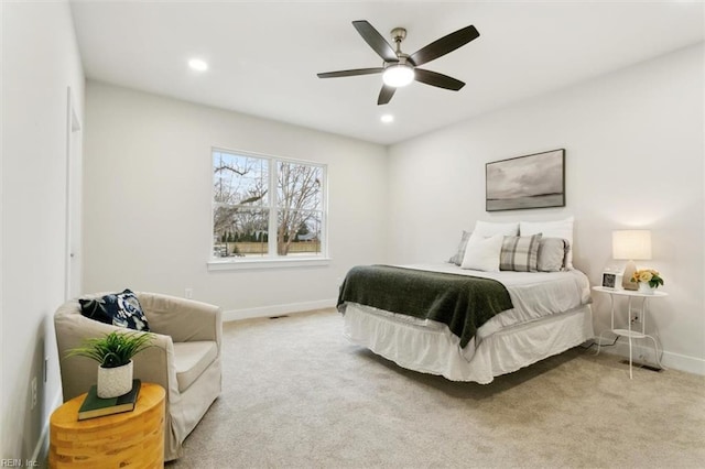 bedroom with ceiling fan and carpet flooring