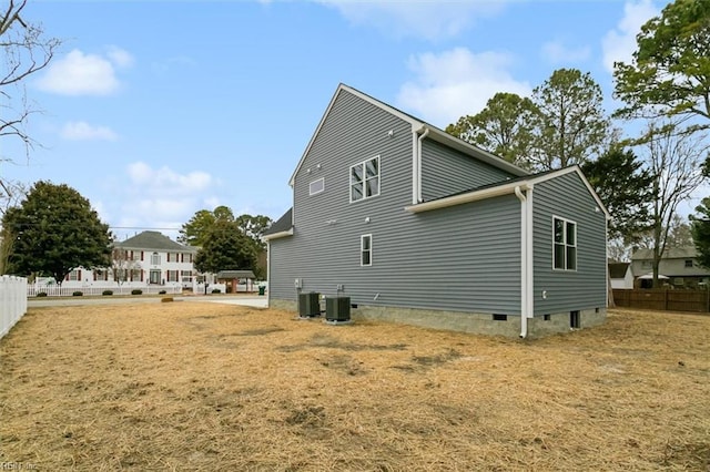 view of home's exterior with central AC unit