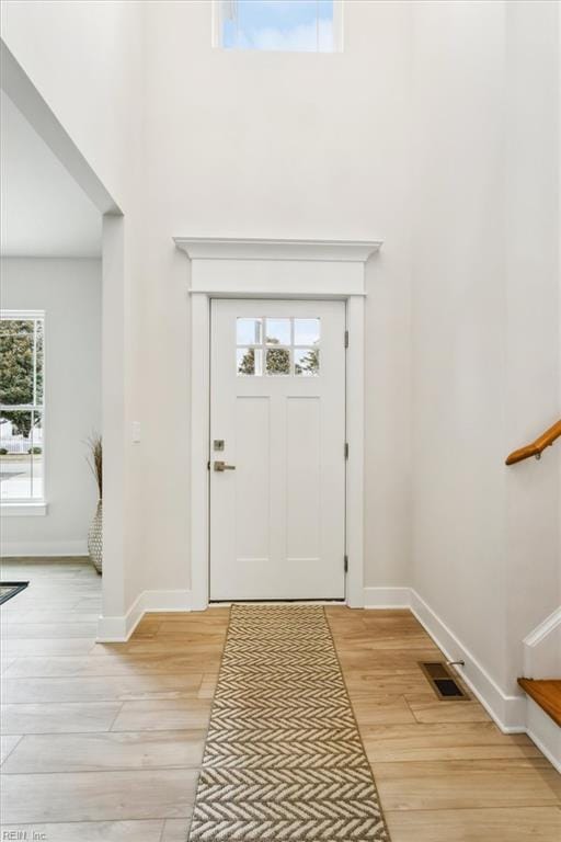 entrance foyer with light hardwood / wood-style floors