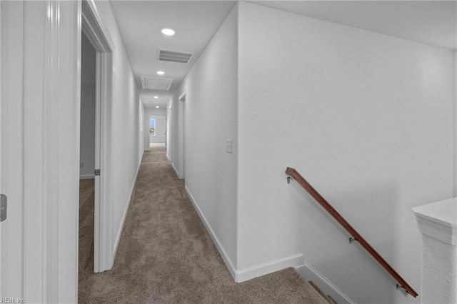 corridor with light colored carpet