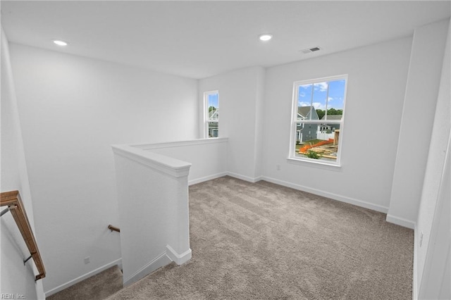 unfurnished room with carpet flooring