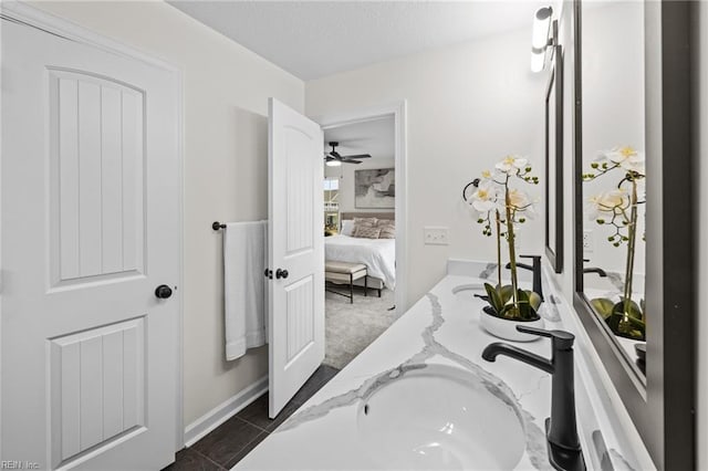 bathroom with vanity and tile patterned floors