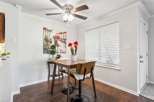 dining space with ceiling fan, dark hardwood / wood-style floors, and crown molding