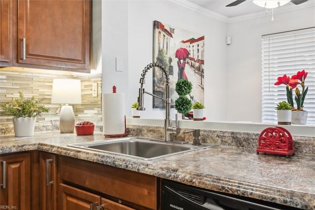 kitchen with ceiling fan, dishwasher, decorative backsplash, sink, and ornamental molding