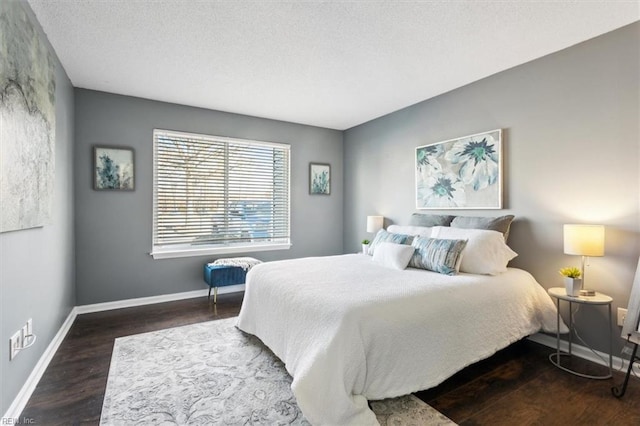 bedroom with dark wood-type flooring