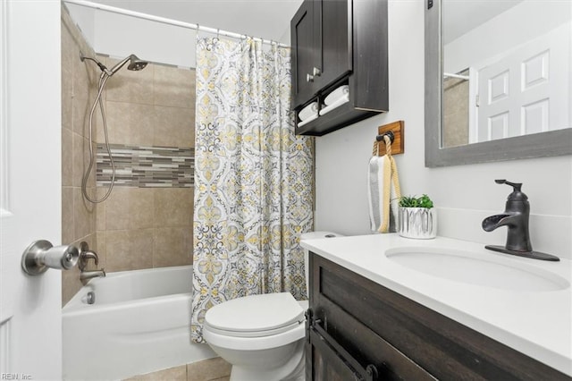 full bathroom with toilet, shower / tub combo, and vanity