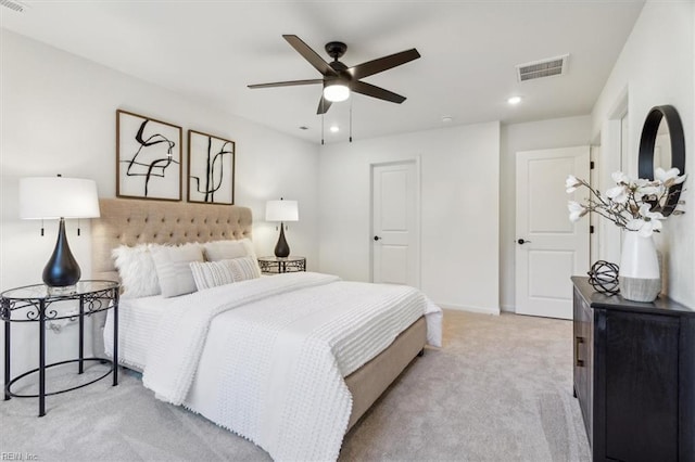 carpeted bedroom with ceiling fan