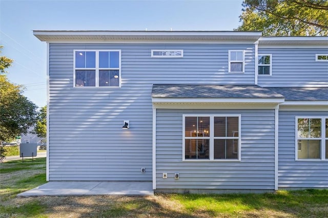 rear view of property with a patio area