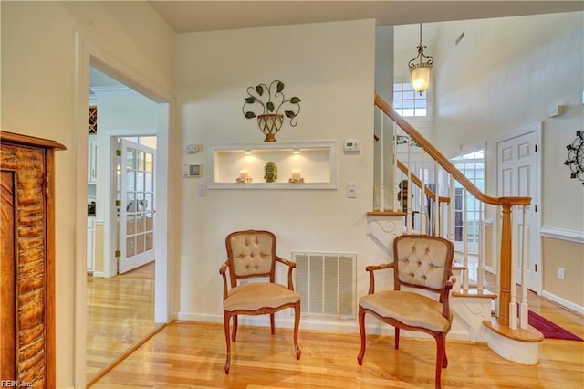 living area with wood-type flooring