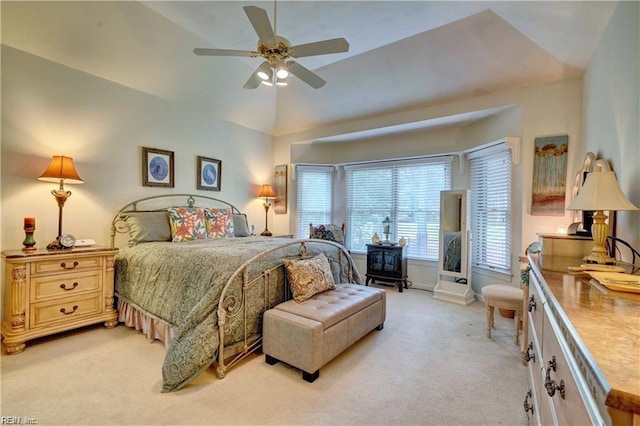 carpeted bedroom featuring ceiling fan and lofted ceiling