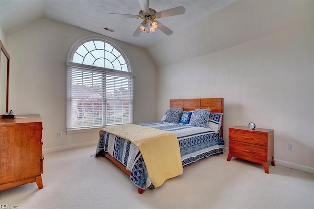 carpeted bedroom featuring vaulted ceiling and ceiling fan