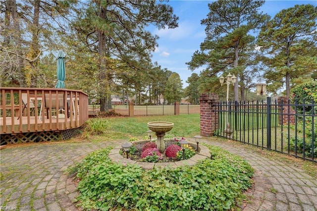 view of yard featuring a wooden deck