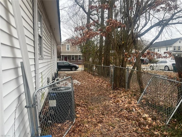 view of yard featuring central AC unit