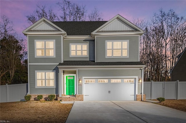 view of front of property featuring a garage